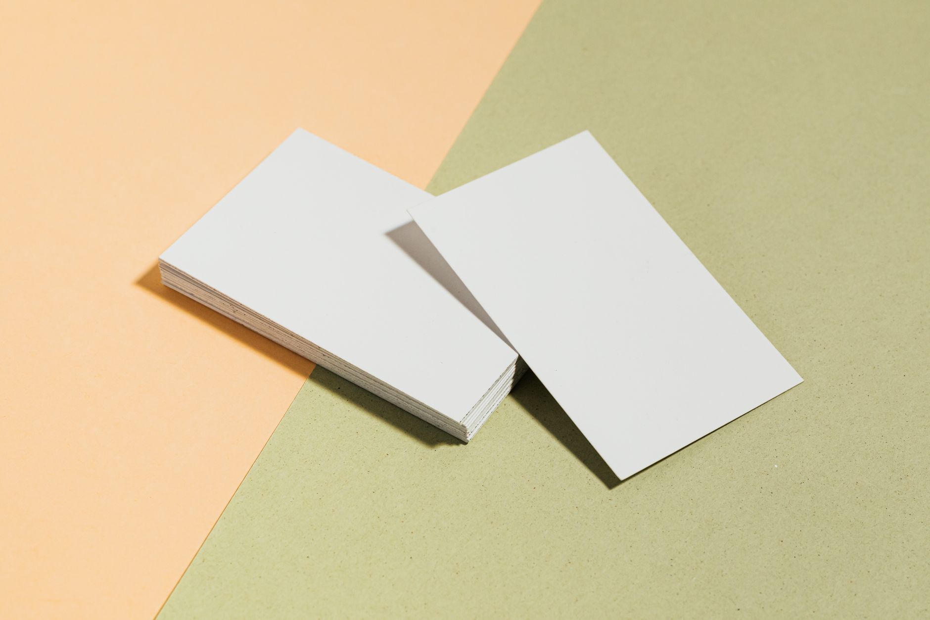 Modern minimalist branding design elements on a desk in a creative office